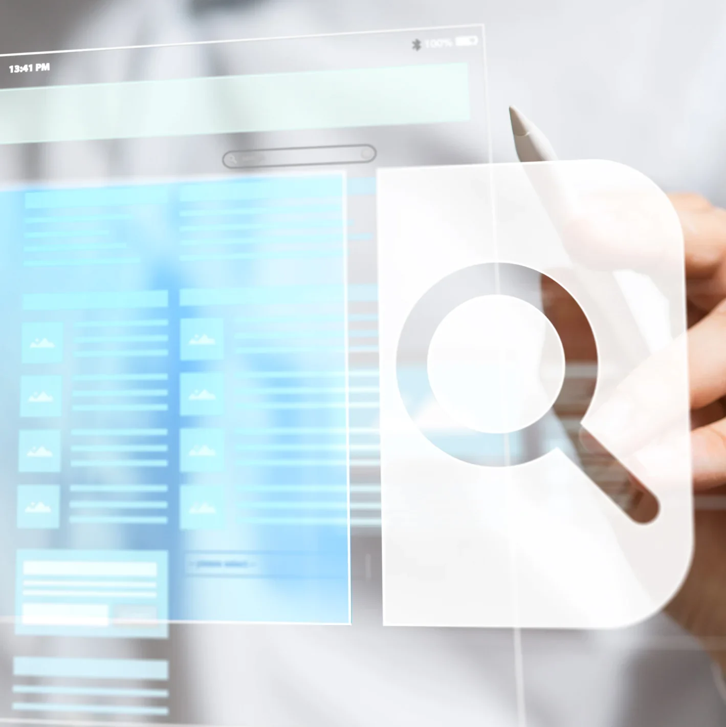 Magnifying glass icon with digital boxes to their left, man in dress shirt as background.