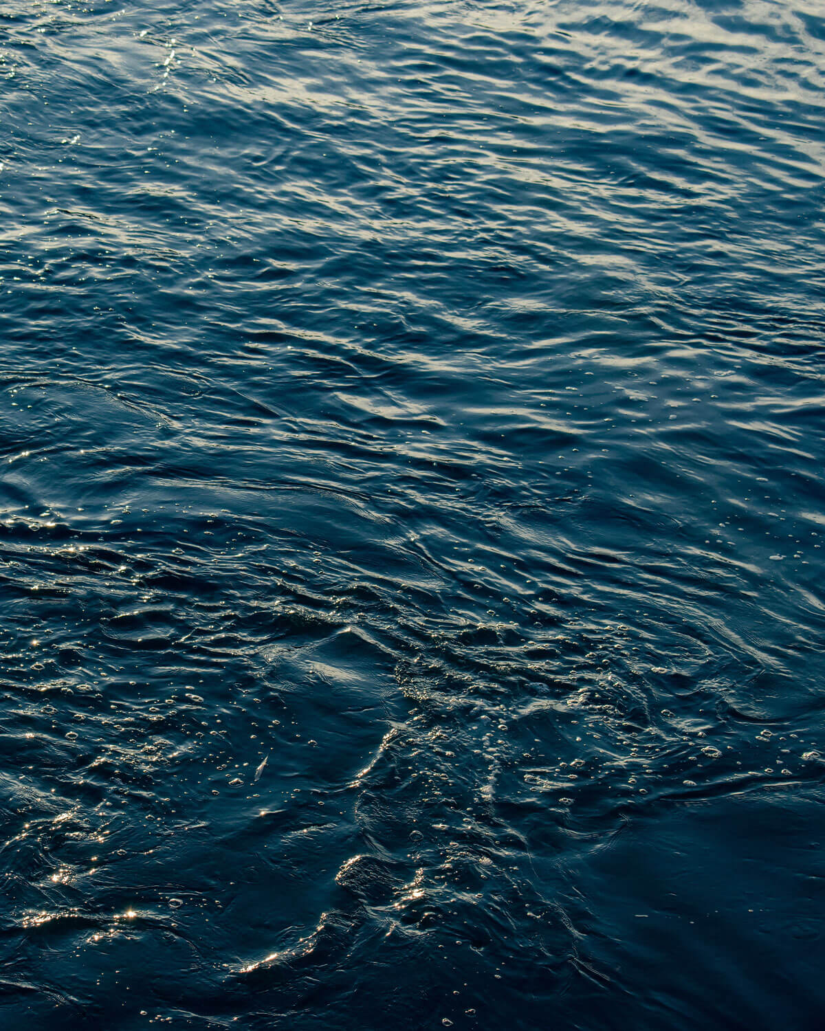 Blue And Turquoise Water With Irregular Wave Structure